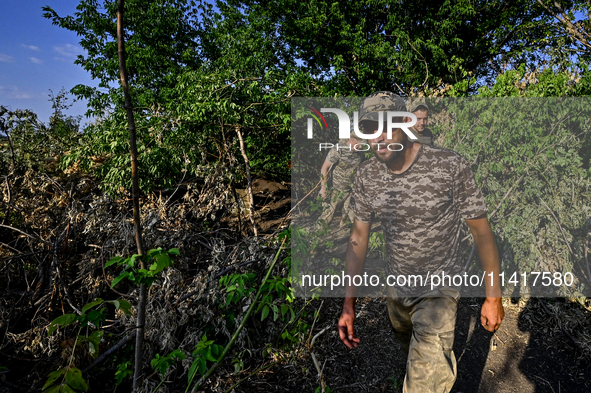 A serviceman of the 24th King Danylo Separate Mechanized Brigade is occupying combat positions near Chasiv Yar, Bakhmut district, in Donetsk...