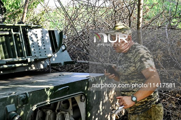 Andrii, a commander of an artillery crew of the 24th King Danylo Separate Mechanized Brigade, is carrying out a combat mission near Chasiv Y...