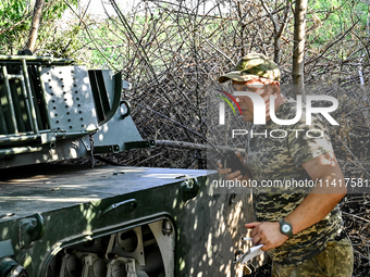 Andrii, a commander of an artillery crew of the 24th King Danylo Separate Mechanized Brigade, is carrying out a combat mission near Chasiv Y...