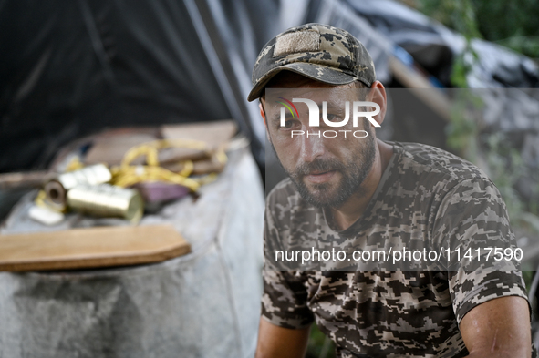 A serviceman of the 24th King Danylo Separate Mechanized Brigade is being pictured in Bakhmut district, Donetsk region, eastern Ukraine, on...