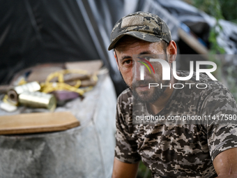 A serviceman of the 24th King Danylo Separate Mechanized Brigade is being pictured in Bakhmut district, Donetsk region, eastern Ukraine, on...