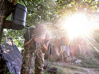 A serviceman of the 24th King Danylo Separate Mechanized Brigade is washing his face at combat positions near Chasiv Yar, Bakhmut district,...