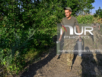 A serviceman of the 24th King Danylo Separate Mechanized Brigade, who goes by the call sign of Myron, is taking combat positions near Chasiv...