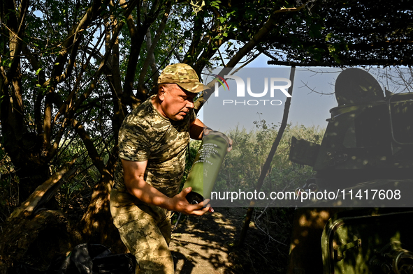 Andrii, a commander of an artillery crew of the 24th King Danylo Separate Mechanized Brigade, is carrying out a combat mission near Chasiv Y...