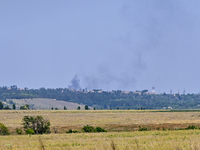 Smoke is rising over the horizon in Bakhmut district, Donetsk region, eastern Ukraine, on July 14, 2024. NO USE RUSSIA. NO USE BELARUS. (