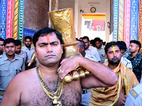 Temple servitors are carrying gold ornaments of temple deities before making the golden dressed ceremony 'Suna Besha' atop their chariots be...