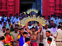 Temple servitors are carrying gold ornaments of temple deities before making the golden dressed ceremony 'Suna Besha' atop their chariots be...