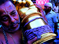 Temple servitors are carrying gold ornaments of temple deities before making the golden dressed ceremony 'Suna Besha' atop their chariots be...