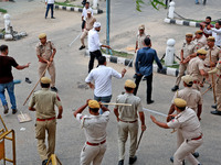 Police personnel are lathicharging the agitators during a protest by various student organizations demanding the conduct of Rajasthan Univer...