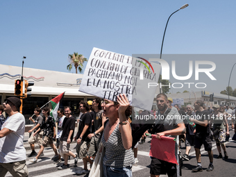 A moment of the demonstration organized by the social movements and networks of the Bagnoli neighborhood in Naples, Italy, on July 15, 2024,...