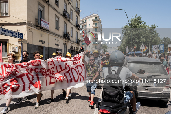 A moment of the demonstration organized by the social movements and networks of the Bagnoli neighborhood in Naples, Italy, on July 15, 2024,...