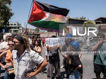 A moment of the demonstration organized by the social movements and networks of the Bagnoli neighborhood in Naples, Italy, on July 15, 2024,...