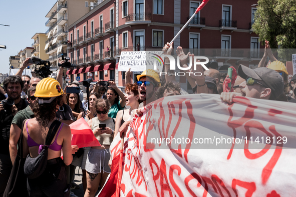 A moment of the demonstration organized by the social movements and networks of the Bagnoli neighborhood in Naples, Italy, on July 15, 2024,...