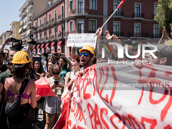 A moment of the demonstration organized by the social movements and networks of the Bagnoli neighborhood in Naples, Italy, on July 15, 2024,...