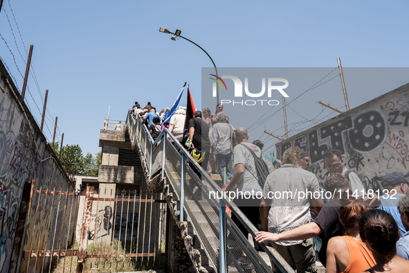 A moment of the demonstration organized by the social movements and networks of the Bagnoli neighborhood in Naples, Italy, on July 15, 2024,...