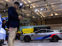 The all-new BMW 4 is being showcased at the GAIKINDO Indonesia International Auto Show (GIIAS) in Tangerang, Indonesia, on July 19, 2024. Th...