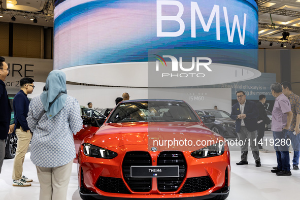 The all-new BMW 4 is being showcased at the GAIKINDO Indonesia International Auto Show (GIIAS) in Tangerang, Indonesia, on July 19, 2024. Th...