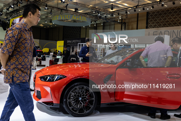 The all-new BMW 4 is being showcased at the GAIKINDO Indonesia International Auto Show (GIIAS) in Tangerang, Indonesia, on July 19, 2024. Th...