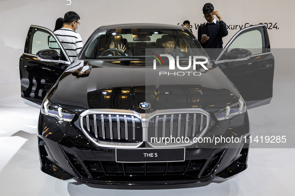 The new BMW 5 is being showcased at the GAIKINDO Indonesia International Auto Show (GIIAS) in Tangerang, Indonesia, on July 19, 2024. The mo...