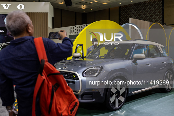 The new all-electric MINI Cooper is being showcased at the GAIKINDO Indonesia International Auto Show (GIIAS) in Tangerang, Indonesia, on Ju...