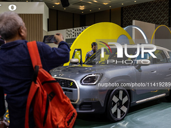 The new all-electric MINI Cooper is being showcased at the GAIKINDO Indonesia International Auto Show (GIIAS) in Tangerang, Indonesia, on Ju...