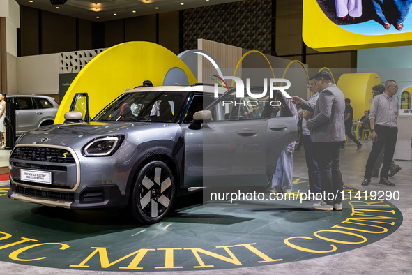 The new all-electric MINI Cooper is being showcased at the GAIKINDO Indonesia International Auto Show (GIIAS) in Tangerang, Indonesia, on Ju...