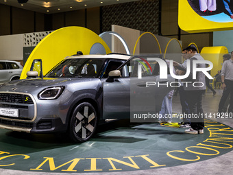 The new all-electric MINI Cooper is being showcased at the GAIKINDO Indonesia International Auto Show (GIIAS) in Tangerang, Indonesia, on Ju...