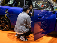 The new all-electric MINI Cooper is being showcased at the GAIKINDO Indonesia International Auto Show (GIIAS) in Tangerang, Indonesia, on Ju...