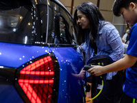 The new all-electric MINI Cooper is being showcased at the GAIKINDO Indonesia International Auto Show (GIIAS) in Tangerang, Indonesia, on Ju...