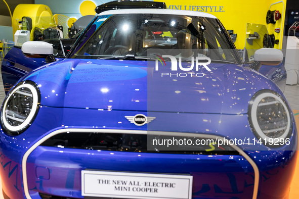 The new all-electric MINI Cooper is being showcased at the GAIKINDO Indonesia International Auto Show (GIIAS) in Tangerang, Indonesia, on Ju...