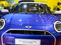 The new all-electric MINI Cooper is being showcased at the GAIKINDO Indonesia International Auto Show (GIIAS) in Tangerang, Indonesia, on Ju...