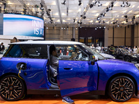 The new all-electric MINI Cooper is being showcased at the GAIKINDO Indonesia International Auto Show (GIIAS) in Tangerang, Indonesia, on Ju...