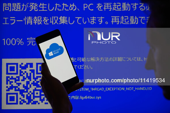 The Microsoft Azure is being displayed on a smartphone with a Windows blue screen visible in the background in this photo illustration in Br...