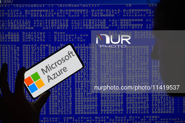 The Microsoft Azure is being displayed on a smartphone with a Windows blue screen visible in the background in this photo illustration in Br...