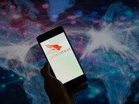 The CrowdStrike logo is being displayed on a smartphone in this photo illustration in Brussels, Belgium, on July 19, 2024. (