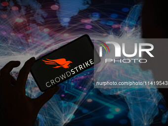 The CrowdStrike logo is being displayed on a smartphone in this photo illustration in Brussels, Belgium, on July 19, 2024. (