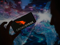 The CrowdStrike logo is being displayed on a smartphone in this photo illustration in Brussels, Belgium, on July 19, 2024. (