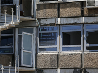 A view of a damaged building in the area of an explosion as Israeli policemen are searching the scene in Tel Aviv, Israel, on July 19, 2024....