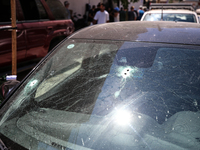 A view of a damaged building in the area of an explosion as Israeli policemen are searching the scene in Tel Aviv, Israel, on July 19, 2024....