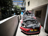 A view of a damaged building in the area of an explosion as Israeli policemen are searching the scene in Tel Aviv, Israel, on July 19, 2024....