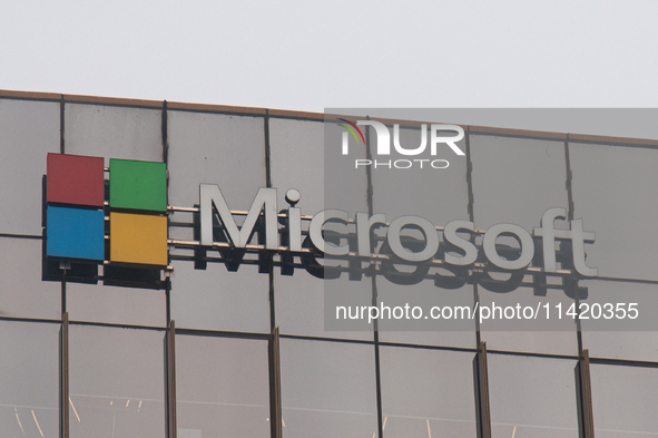 A signage of Microsoft is being seen outside its office building in Gurugram, in the outskirts of New Delhi, India, on July 19, 2024. Airlin...