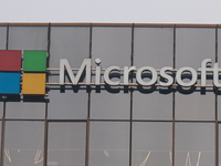 A signage of Microsoft is being seen outside its office building in Gurugram, in the outskirts of New Delhi, India, on July 19, 2024. Airlin...