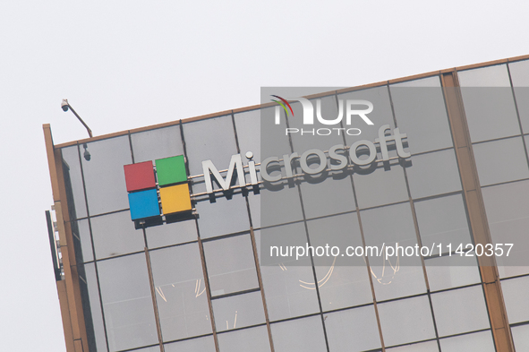 A signage of Microsoft is being seen outside its office building in Gurugram, in the outskirts of New Delhi, India, on July 19, 2024. Airlin...