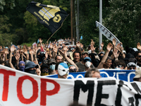 Protesters are marching during a demonstration against the construction of a giant water reservoir (mega-bassine) in Migne-Auxances, western...