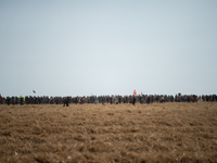 Protesters are marching during a demonstration against the construction of a giant water reservoir (mega-bassine) in Migne-Auxances, western...