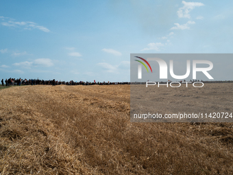 Protesters are marching during a demonstration against the construction of a giant water reservoir (mega-bassine) in Migne-Auxances, western...