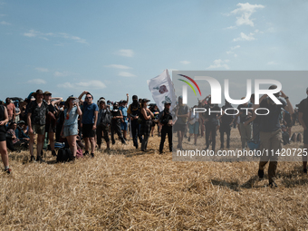 Protesters are marching during a demonstration against the construction of a giant water reservoir (mega-bassine) in Migne-Auxances, western...