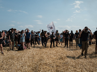 Protesters are marching during a demonstration against the construction of a giant water reservoir (mega-bassine) in Migne-Auxances, western...