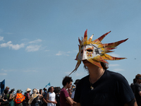 Protesters are marching during a demonstration against the construction of a giant water reservoir (mega-bassine) in Migne-Auxances, western...