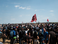 Protesters are marching during a demonstration against the construction of a giant water reservoir (mega-bassine) in Migne-Auxances, western...